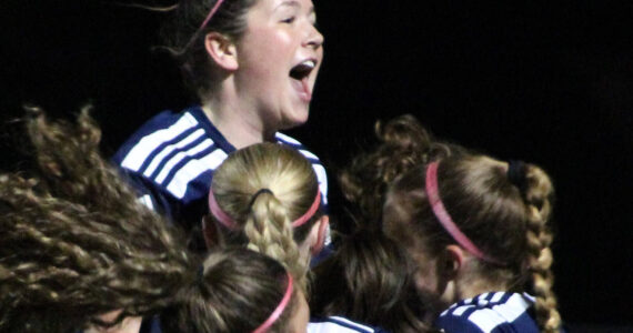 Elisha Meyer/Kitsap News Group photos
Spartan players celebrate after Magda Rufo-Hill scores the only goal of the match to win 1-0 over North Kitsap Oct. 29.