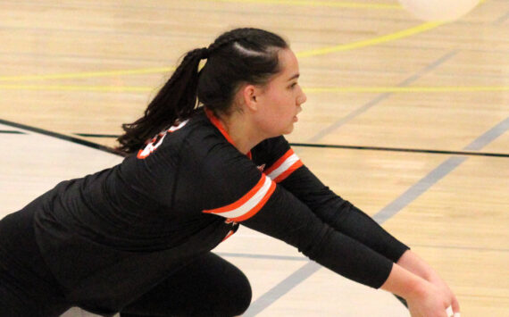 Elisha Meyer/Kitsap News Group photos
CK sophomore Manaia Pasi digs a Lincoln spike to keep the point alive.