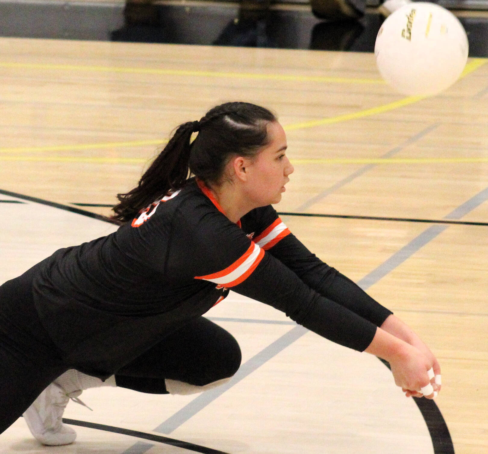 Elisha Meyer/Kitsap News Group photos
CK sophomore Manaia Pasi digs a Lincoln spike to keep the point alive.