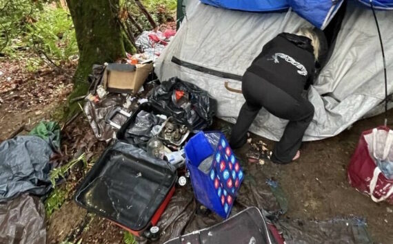 Britney Fletcher-West/Kitsap News Group
A HEART team member clearing out an encampment in Kitsap County.