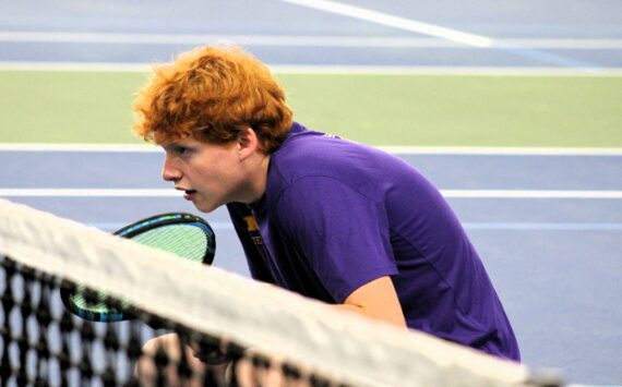 Elisha Meyer/Kitsap News Group
North Kitsap’s Mason Repp crouches down while awaiting the serve from his partner Justin Gallant on day one of the 2024 district tournament.