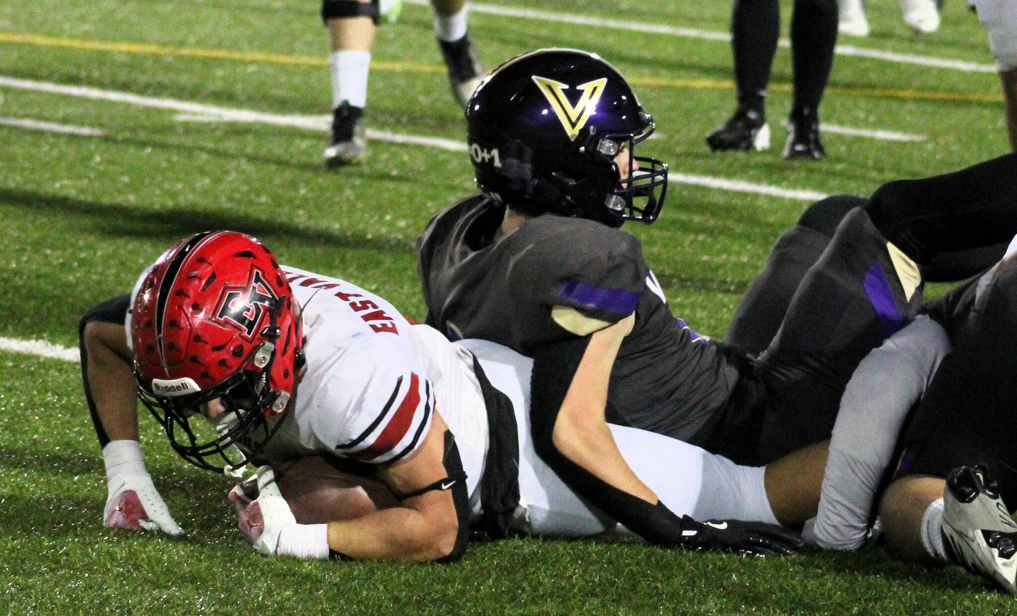 Elisha Meyer/Kitsap News Group photos
Senior Lelond Anderson helps bring down an East Valley ball carrier.