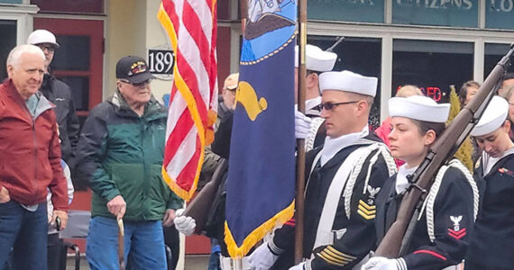 Tyler Shuey/Kitsap News Group photos
Members of the U.S. Navy stroll through the Veterans Day parade in Poulsbo Nov. 9.