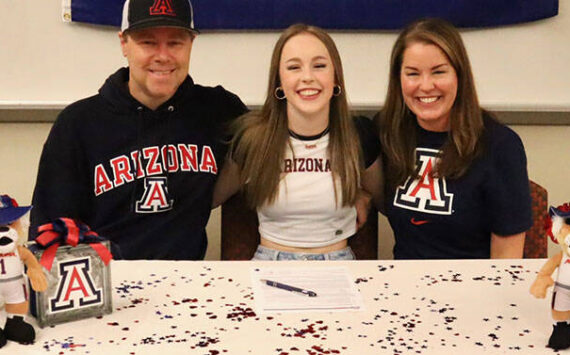 Mead Family courtesy photo
Kingston senior Delaney Mead, middle, signed her letter of intent to attend the University of Arizona Nov. 13 at Kingston High School. Joining her was dad Cory and mom Shannon.