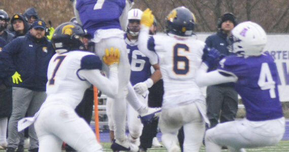 Steve Powell/Kitsap News Group photos
Rylin Lang (7) goes up for a catch for Anacortes with Isaiah Beyer (7) and Paxton Malloy (6) defending for Bainbridge.