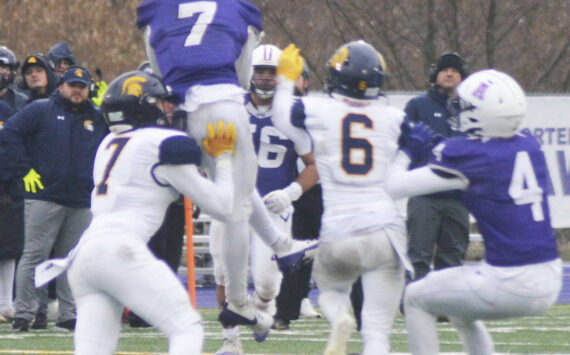 Steve Powell/Kitsap News Group photos
Rylin Lang (7) goes up for a catch for Anacortes with Isaiah Beyer (7) and Paxton Malloy (6) defending for Bainbridge.