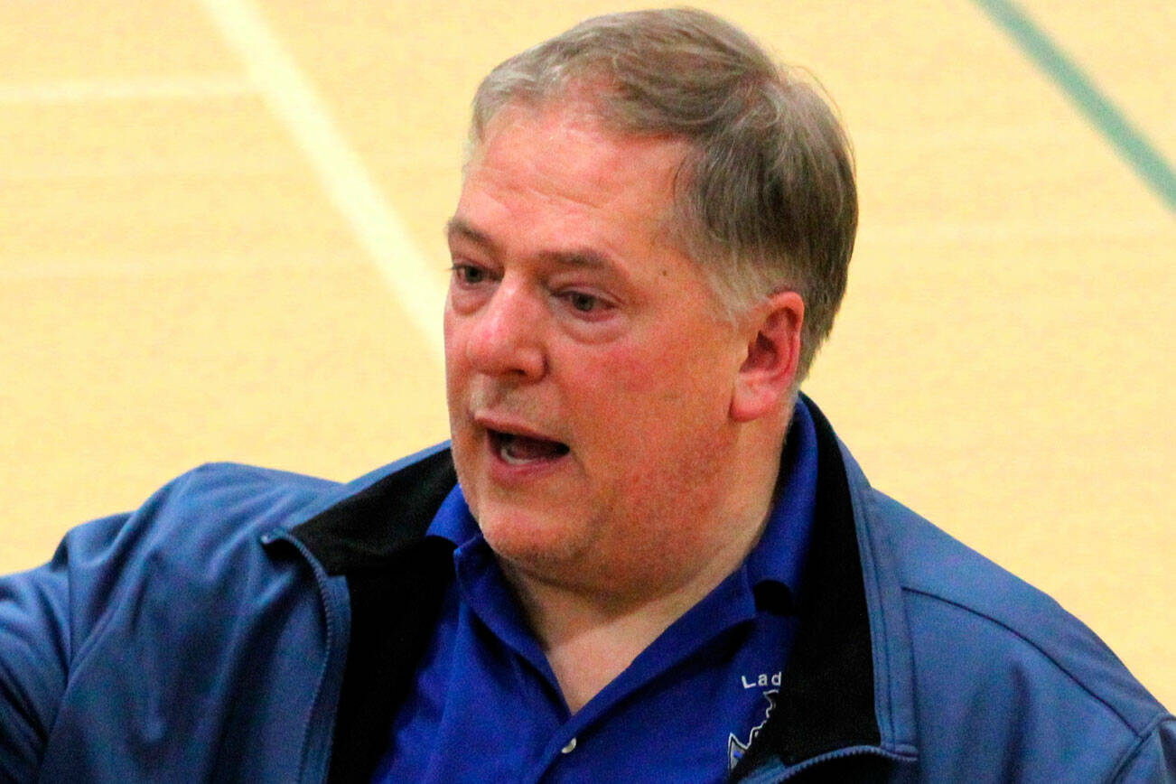 Elisha Meyer/Kitsap News Group
Olympic High School’s Keith Peden leaves the floor one last time as the volleyball coach of the Trojans Nov. 9.