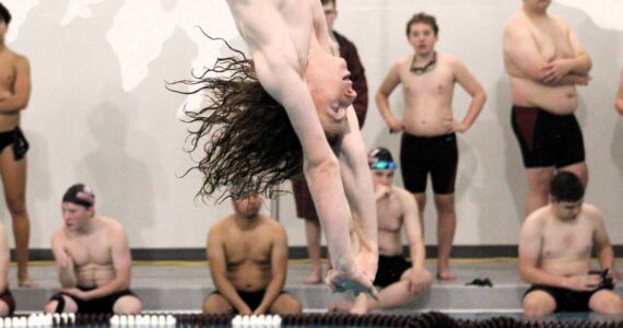 Elisha Meyer/Kitsap News Group photos
South Kitsap senior Ronan Wilson takes a practice dive before the contest begins.