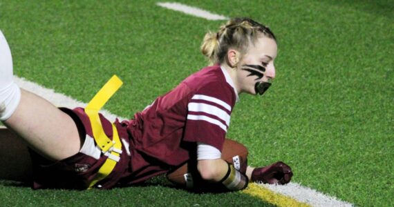 Elisha Meyer/Kitsap News Group
South Kitsap’s Madilyn Aaenson comes down with a catch in the back of the endzone for a touchdown in the last pay of the first half against Sumner.