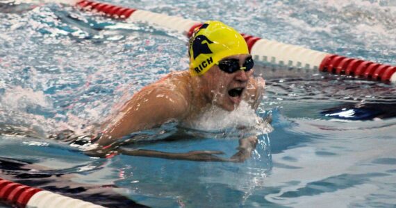 Elisha Meyer/Kitsap News Group
Bainbridge junior Ryan Rich swims to victory in the 100-yard breaststroke against Olympic.