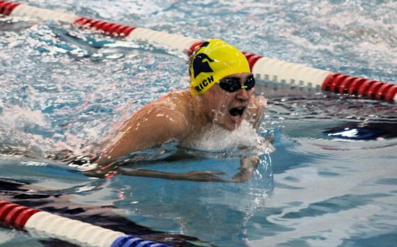 Elisha Meyer/Kitsap News Group
Bainbridge junior Ryan Rich swims to victory in the 100-yard breaststroke against Olympic.