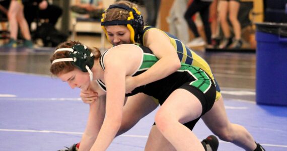 Elisha Meyer/Kitsap News Group photos
Klahowya’s Kaliani Fultz works to try an escape a takedown from her opponent.