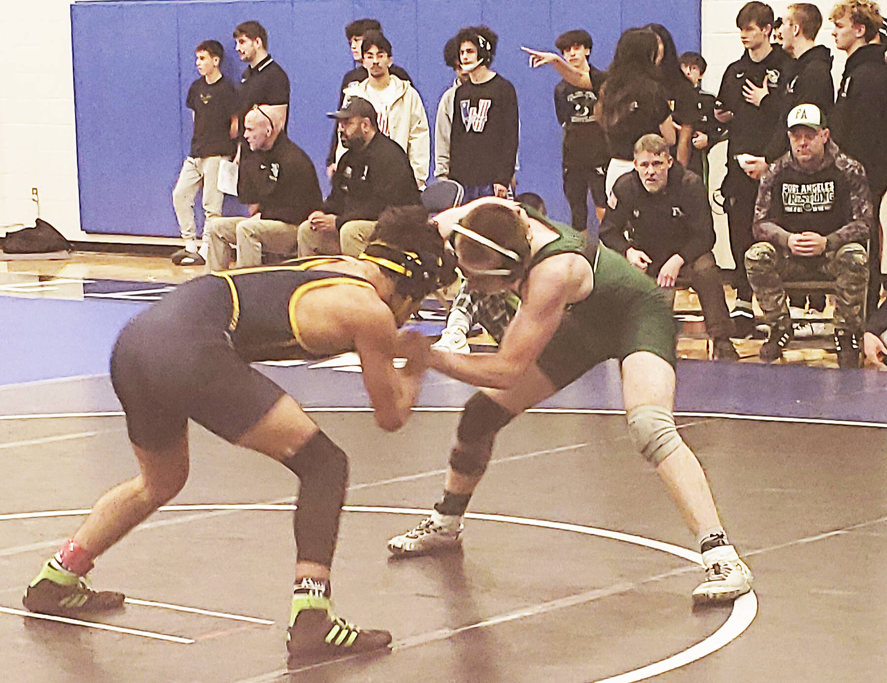 Mark Storer/Kitsap News Group photos
Omid Neghabat of Bainbridge takes on Cole Anderson of Port Angeles at the North Mason wrestling tournament.