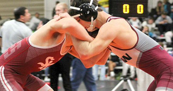 File photo
SK’s Caleb Strobel Fox, left, beat Eli Calderon of Curtis in a matchup Jan. 8 in Port Orchard.